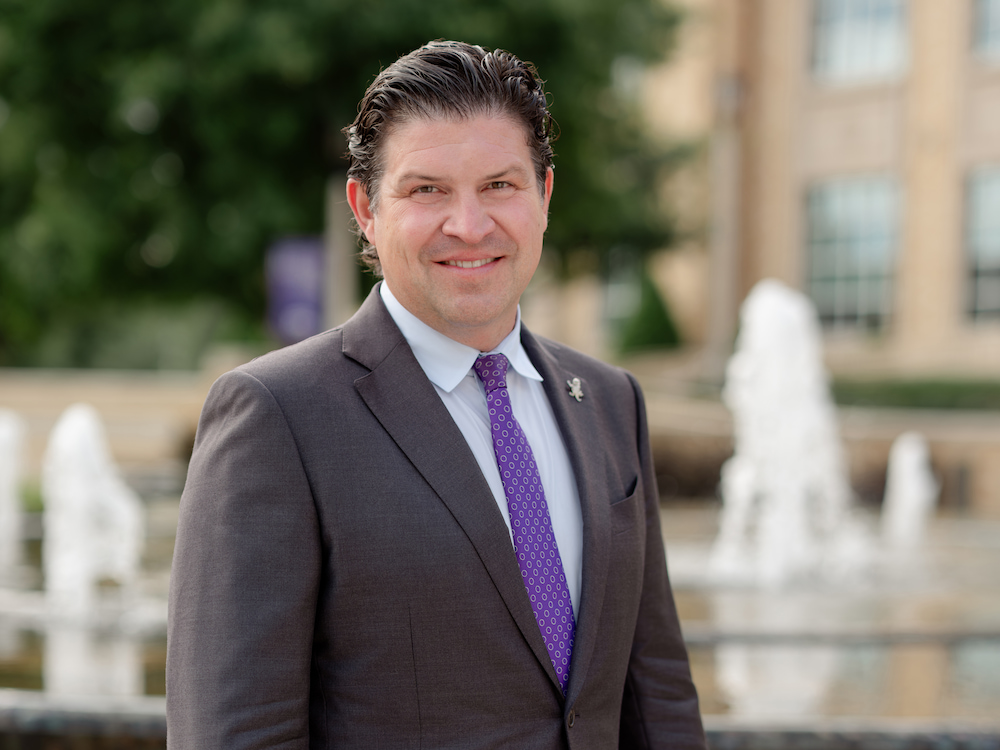 Daniel Pullin with The Harrison fountain in the background